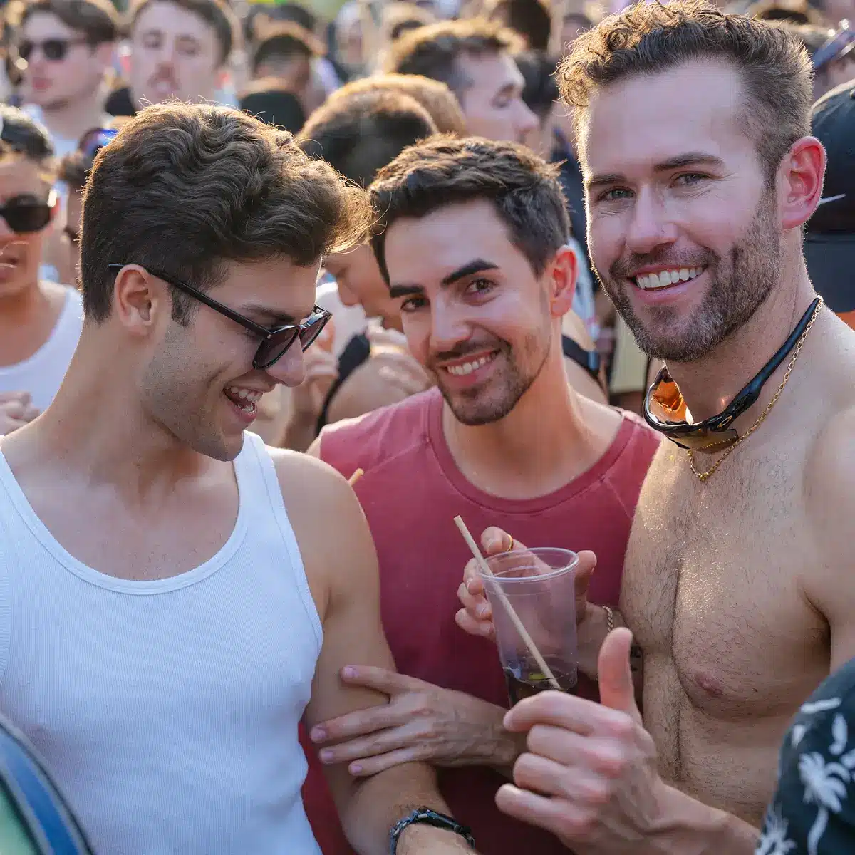 Crowds celebrating Clapham Pride at Arch Clapham street party with drag performers, DJs, dancing and a lively LGBTQ+ atmosphere on Voltaire Road.