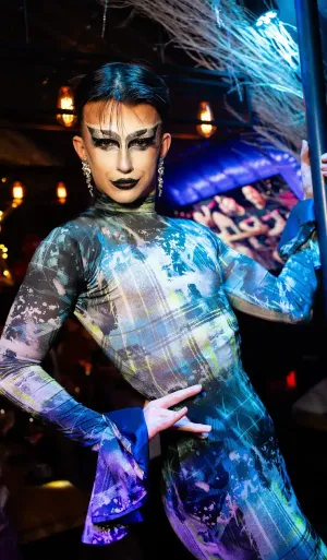 Dany Diamond, drag host at Arch Clapham, posing on stage during a live performance at the popular gay bar in London.